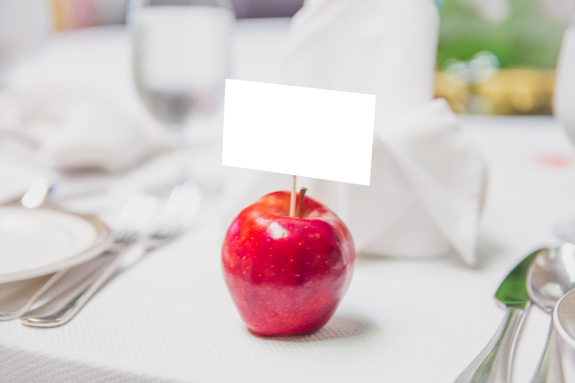 Luxury table setting with apple in the center